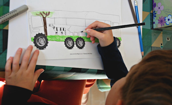 Drawing a safari truck using a "complete the truck" wheels printable