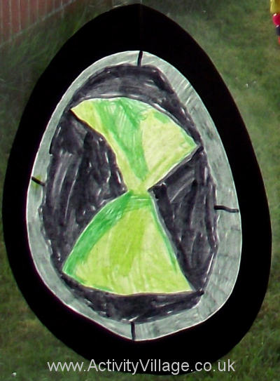 Stained glass colouring egg in window