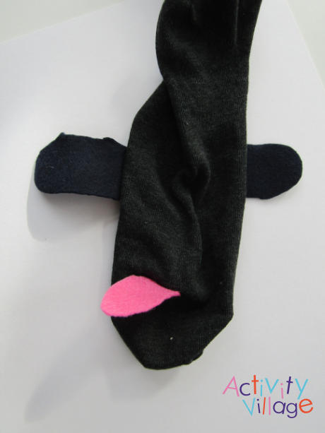 Dog sock puppet - placing the tongue in the correct position