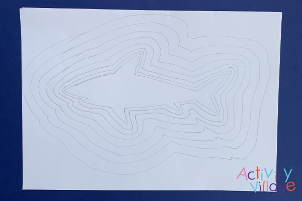 His first shark drawing with wavy lines