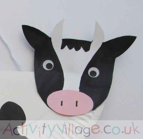 Paper plate cow's head - use as a guide for cutting and colouring