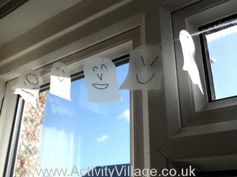 Plastic milk bottle ghost bunting