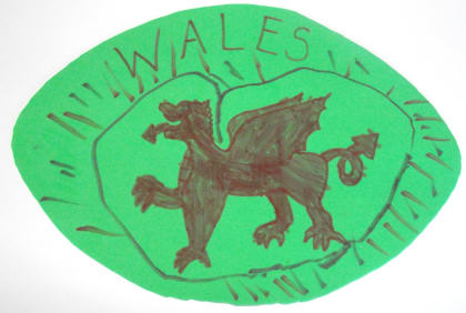 Rugby ball mouse pad craft with Welsh dragon decoration