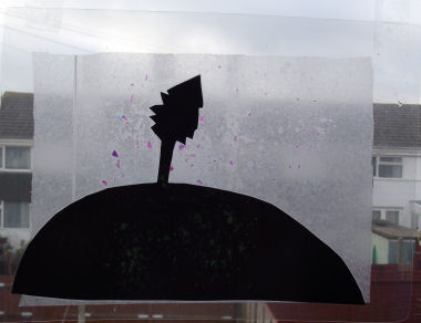 Sam's Christmas tree window silhouette