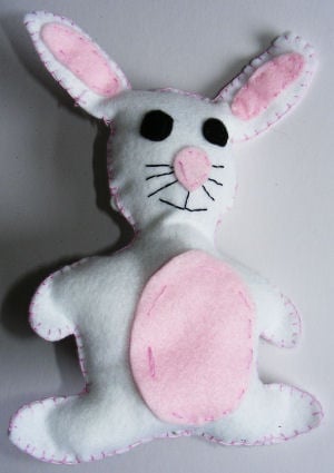 Felt rabbit craft - cute bunny stitched from white and pink felt