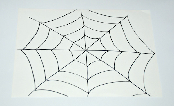 A spider web drawn with sharpies