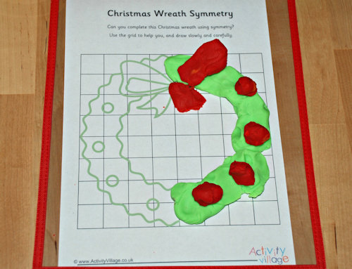 Christmas symmetry page completed with playdough