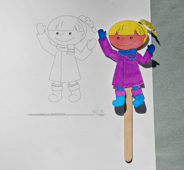 Using colouring pages to create stick puppets