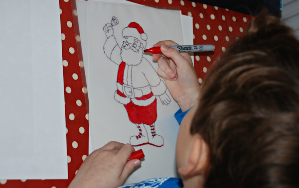 Colouring in his Santa Claus