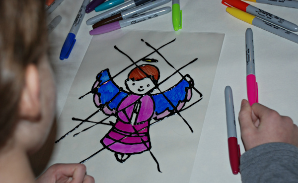 Creating her angel stained glass picture