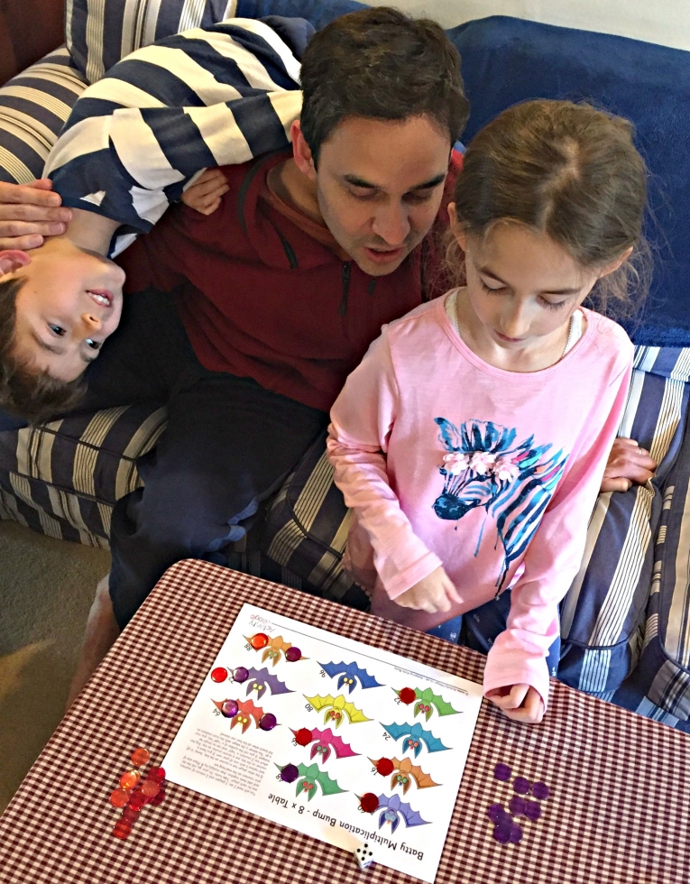 Playing Batty Muliplication Bump with her dad - and someone else wanted to get involved!