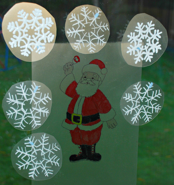 Santa Claus and snowflake window art