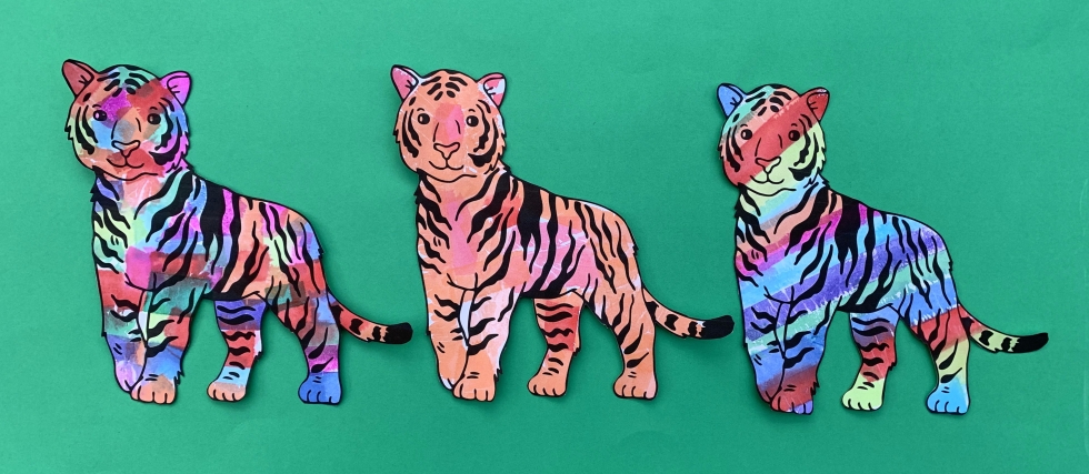 3 completed and cut out tigers