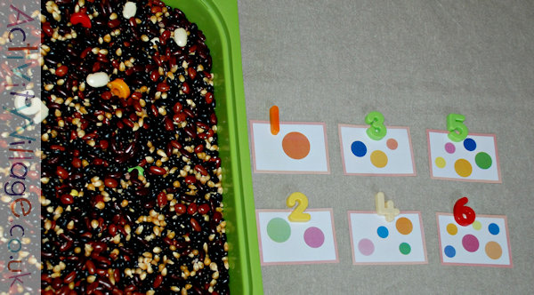 Match the numbers to the dot, using a sensory tub of beans