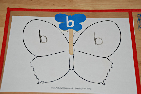Practising writing letters on the butterfly wings
