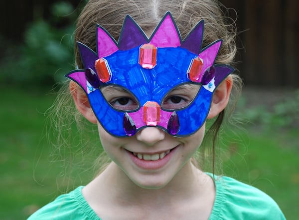 Wearing her colourful mask