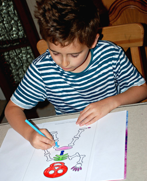 Colouring in his skeleton colouring page