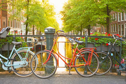 Bikes on a bridge in Amsterdam, capital city of the Netherlands