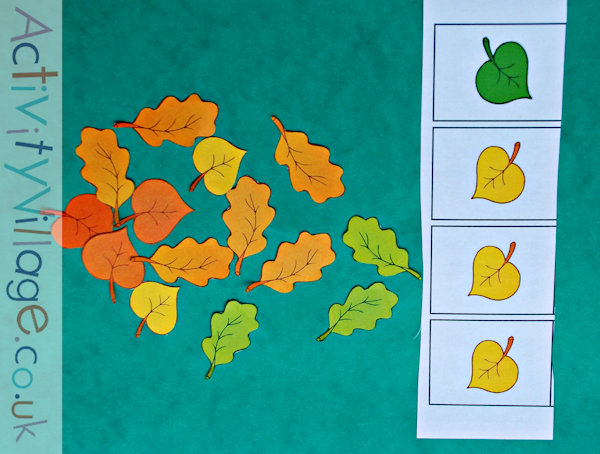 Cutting out the leaves from the autumn leaf dominoes set