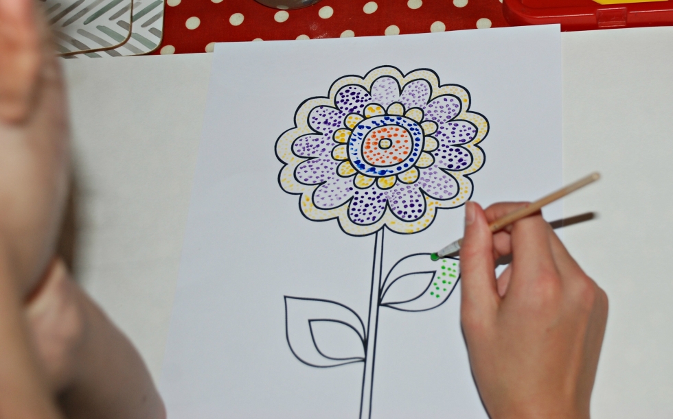 Making her first dotty flower