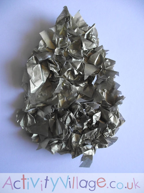 Golden egg craft - scrunched up tissue paper