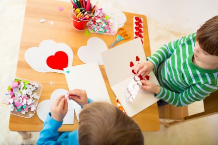 Kids enjoying Valentine's crafts