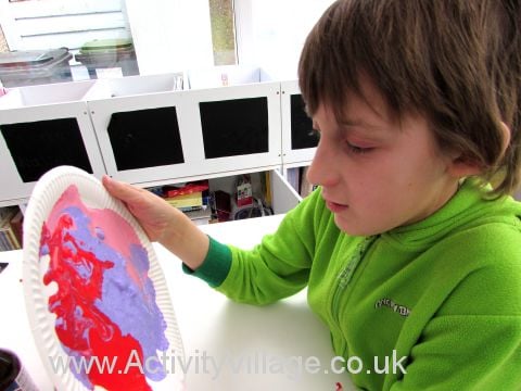 Marbled heart card - moving the paper plate around so the paint runs