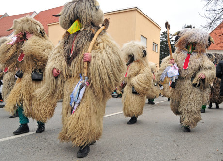 Men wearing kurent folk costumes in a carnival parade