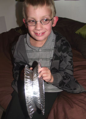 Playing the homemade cymbals