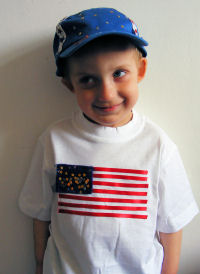 Sam wears stars and stripes T-shirt