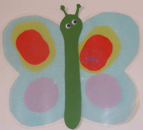 Tissue paper suncatcher butterfly by older child Tissue paper suncatcher butterfly by older child